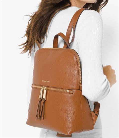 michael kors rhea zip slim backpack|Michael Kors Rhea Zip Medium Slim Backpack .